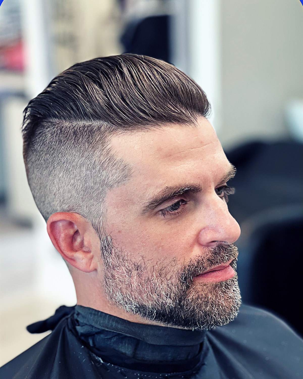 Precision men's side-part fade haircut by BelloErik in Wilton Manors
